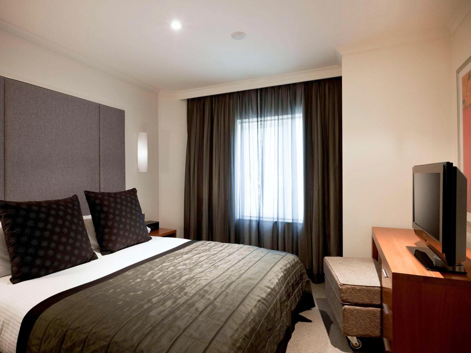 فندق أجنحة ذا سيبيل كواي ويست سيدني المظهر الخارجي الصورة A bedroom at the hotel